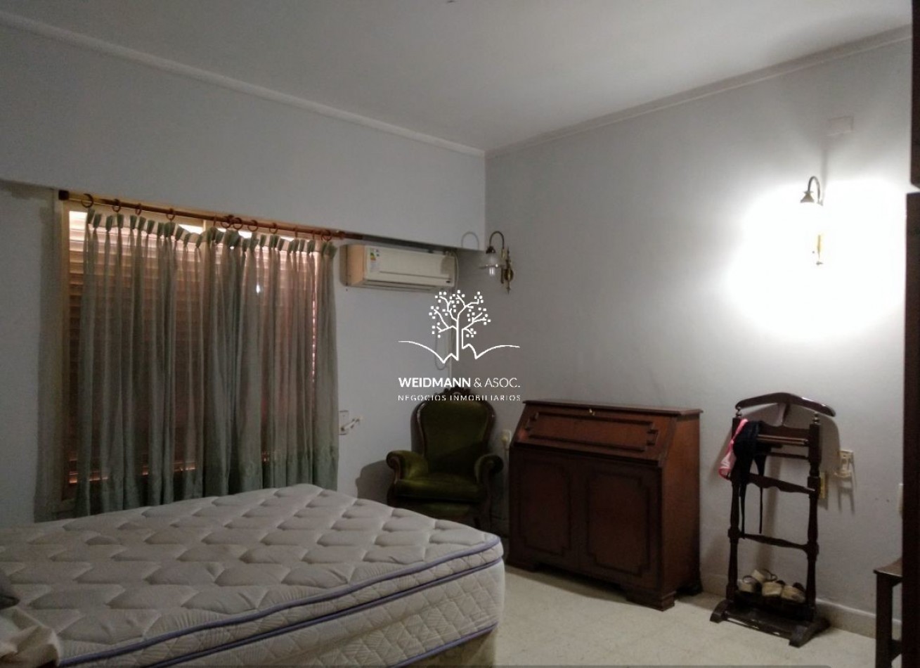 Gran predio con casa y quincho, salida a 3 calles, Santo Tome
