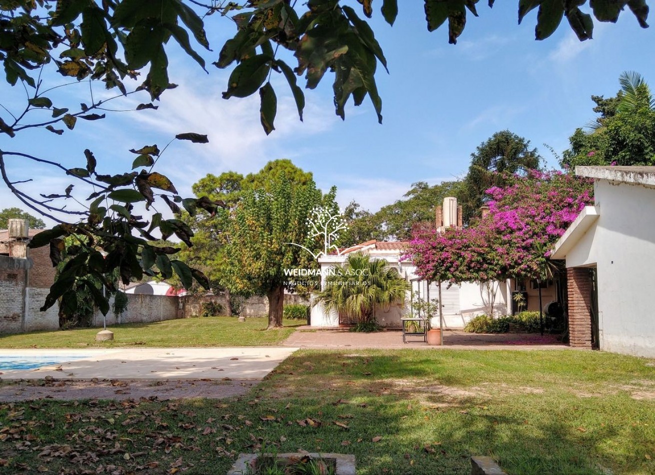 Gran predio con casa y quincho, salida a 3 calles, Santo Tome